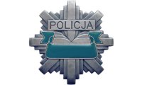 Zdjęcie kolorowe. Przedstawiające odznakę policyjną.