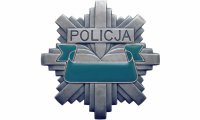 Zdjęcie kolorowe, przedstawiające odznakę policyjną.