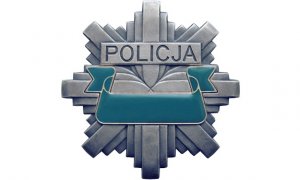 Zdjęcie przedstawiające odznakę policyjną.